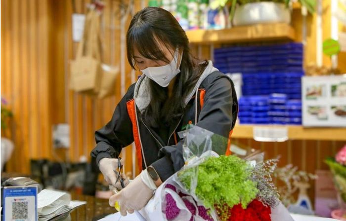 Nghỉ lễ Quốc khánh 2/9 kéo dài 5 ngày thì được hưởng nguyên lương bao nhiêu ngày? Ảnh: Hà Quân, ảnh minh họa.↵
