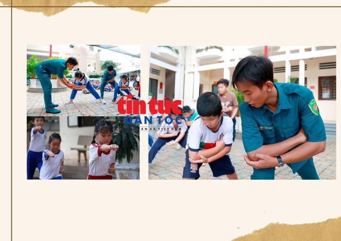 Các chiến sĩ dân quân trẻ tận tình hướng dẫn trẻ em qua từng động tác võ để rèn luyện sức khỏe.