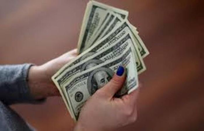 USD ngân hàng duy trì vùng bán ra 26.330 đồng. (Ảnh minh hoạ)
