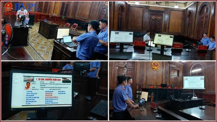  Kiểm sát viên phối hợp kiểm tra, vận hành hồ sơ vụ án điện tử và hệ thống trình chiếu tài liệu, chứng cứ tại phòng xử.