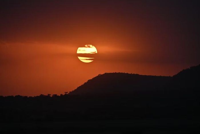 Cảnh hoàng hôn tại khu bảo tồn quốc gia Maasai Mara ở Kenya, ngày 13/8/2026. (Ảnh: THX/TTXVN phát)
