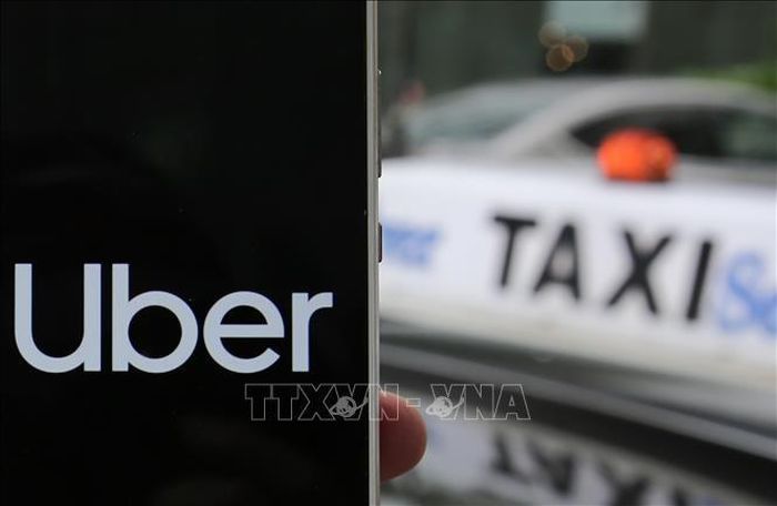 Biểu tượng của Uber. Ảnh: TTXVN