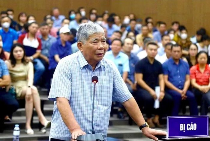 Ông Lê Thanh Thản tại phiên tòa mở giữa năm 2023.