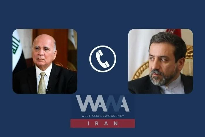 Ngoại trưởng Iraq Fuad Hussein điện đàm với Ngoại trưởng Iran Seyed Abbas Araghchi. Ảnh: WANA.