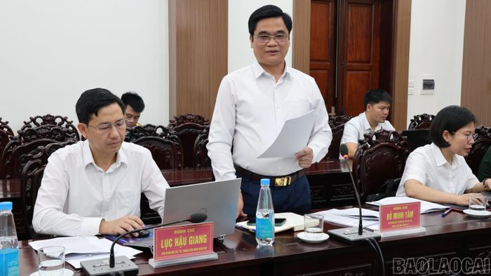 Các đại biểu thảo luận tại buổi làm việc.