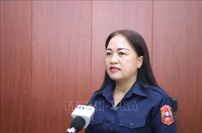 Bà Xaythanith Somphavanh, cán bộ của Bộ Văn hóa và Du lịch Lào, chia sẻ về nét tương đồng với văn hóa Lào. Ảnh: Xuân Tú/PV TTXVN tại Lào