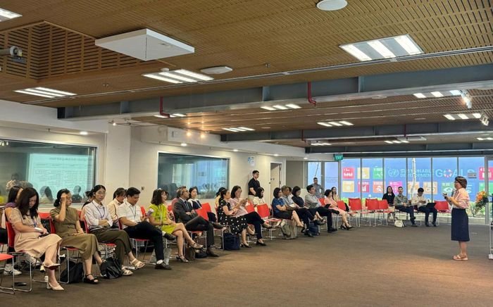 Trao đổi thông tin tại hội thảo. Ảnh: Mai Hoa