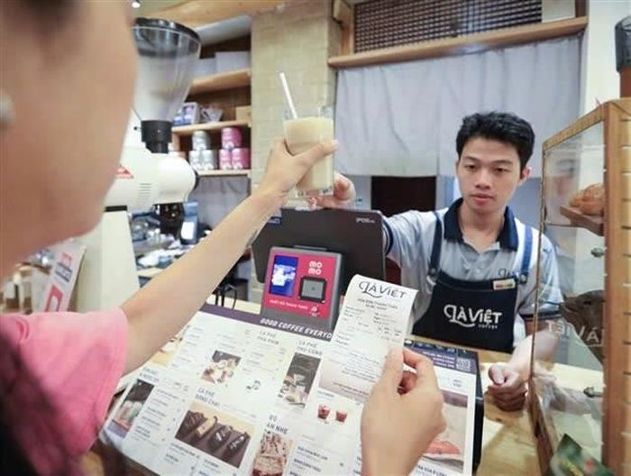 Một đơn vị phát hành hoá đơn điện tử khởi tạo từ máy tính tiền. Ảnh: TTXVN