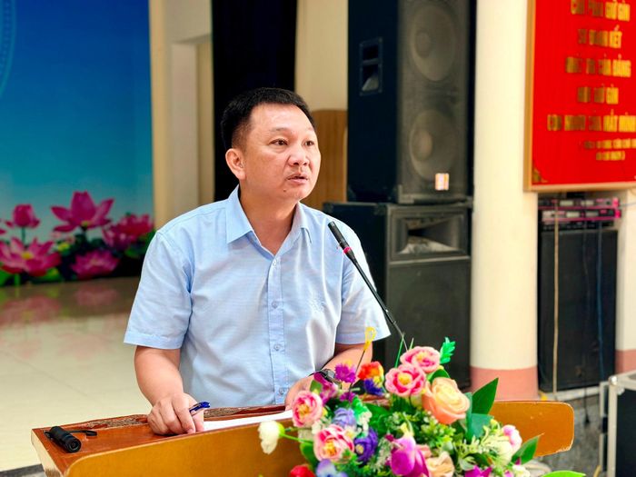 Phó Chủ tịch UBND xã Nguyễn Văn Minh phát biểu tại hội nghị. Ảnh: Thanh Hà