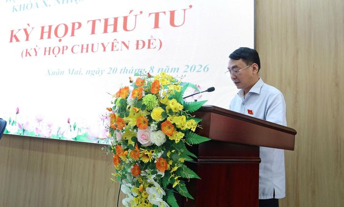 Bí thư Đảng ủy, Chủ tịch HĐND xã Xuân Mai Hoàng Minh Hiến phát biểu. Ảnh: PV