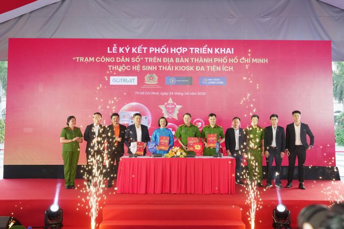 Lễ ký kết phối hợp triển khai Trạm Công dân số trên địa bàn TPHCM. Ảnh: H.Khánh