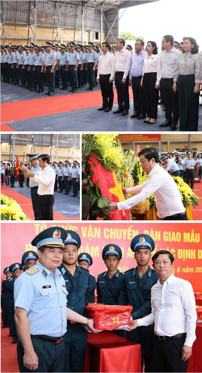  Chủ tịch HĐND TPHCM Võ Văn Minh và Trung tướng Vũ Hồng Sơn, Tư lệnh Quân chủng Phòng không - Không quân di chuyển mẫu sinh phẩm hài cốt liệt sĩ lên xe chuyên dụng tới Trung tâm giám định ADN, Viện Hàn lâm KH-CN Việt Nam. Ảnh: QUANG PHÚC 