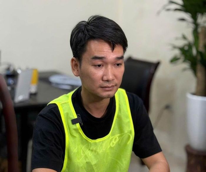 Đối tượng Vũ Hải Long tại cơ quan Công an. Ảnh: CAHN