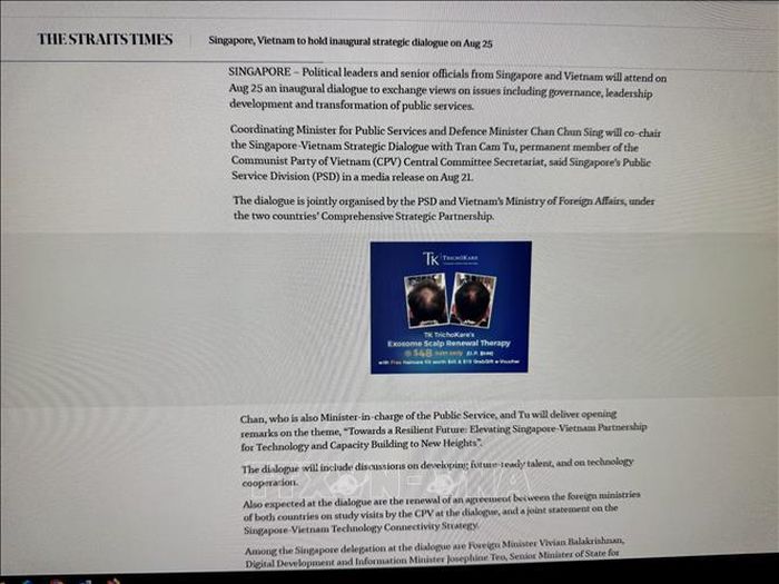 Tờ The Straits Times đưa tin về chuyến thăm và cuộc Đối thoại chiến lược Việt Nam-Singapore lần thứ nhất. Ảnh: Đỗ Vân/PV TTXVN tại Singapore