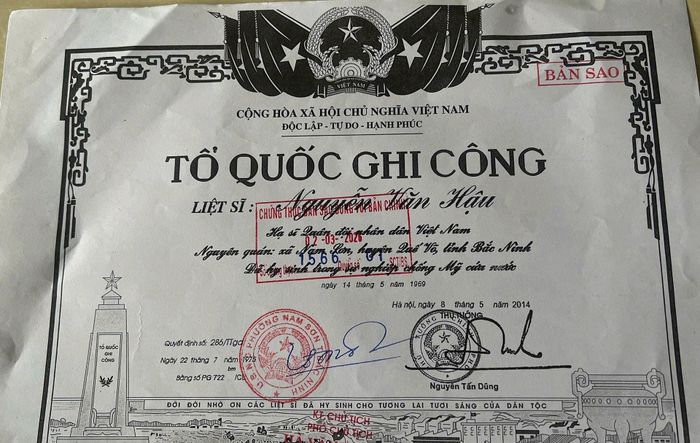 Bằng Tổ quốc ghi công liệt sĩ Nguyễn Văn Hậu. Ảnh: Quang Cường