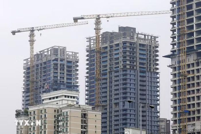 Công trình xây dựng tòa nhà cao tầng ở Thâm Quyến, Trung Quốc. (Ảnh: Kyodo/TTXVN)