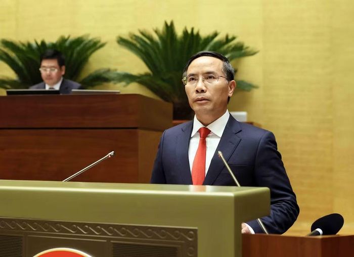 Thống đốc Ngân hàng Nhà nước Việt Nam Phạm Đức Ấn trình bày Báo cáo giải trình, tiếp thu, chỉnh lý dự thảo Luật sửa đổi, bổ sung một số điều của Luật Ngân hàng Nhà nước Việt Nam, Luật Phòng, chống rửa tiền và Luật Các tổ chức tín dụng. (Ảnh: An Đăng/TTXVN)