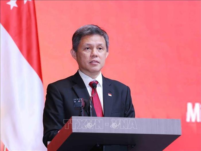 Phó Tổng Thư ký Đảng Hành động Nhân dân Singapore, Bộ trưởng Quốc phòng kiêm Bộ trưởng Điều phối dịch vụ công Chan Chun Sing phát biểu chúc mừng. Ảnh: Phương Hoa/TTXVN