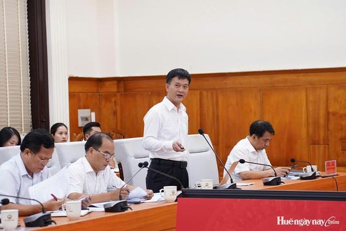  Giám đốc Sở Khoa học và Công nghệ Nguyễn Xuân Sơn báo cáo tại cuộc họp. Ảnh: Ngọc Hiếu