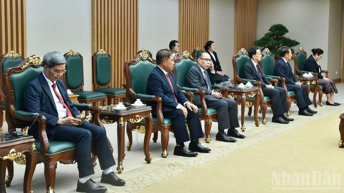  Đoàn đại biểu cấp cao Lào tham dự buổi tiếp. (Ảnh: THANH GIANG) 