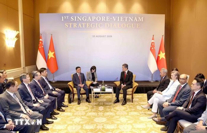 Phó Tổng Thư ký Đảng Hành động Nhân dân Singapore, Bộ trưởng Bộ Quốc phòng kiêm Bộ trưởng Điều phối dịch vụ công Chan Chun Sing chủ trì Lễ đón chính thức Ủy viên Bộ Chính trị, Thường trực Ban Bí thư Trần Cẩm Tú. (Ảnh: Phương Hoa/TTXVN)