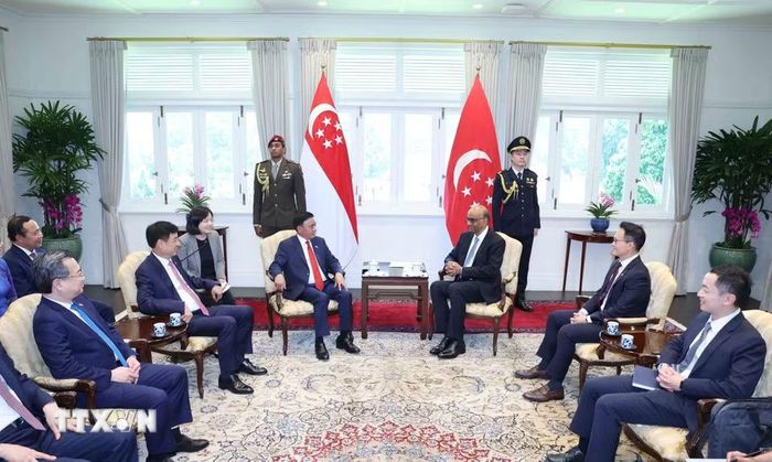 Thường trực Ban Bí thư Trần Cẩm Tú hội kiến Tổng thống Singapore Tharman Shanmugaratnam. (Ảnh: Phương Hoa/TTXVN)
