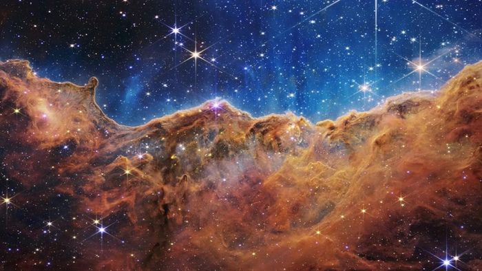 Vách Đá Vũ Trụ là rìa của một khoang khí khổng lồ bên trong NGC 3324, cách Trái Đất khoảng 7.600 năm ánh sáng. Ảnh: NASA