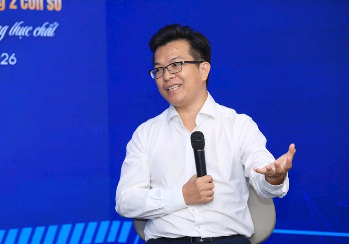 TS Bùi Thanh Minh, Phó Giám đốc chuyên môn Văn phòng Ban Nghiên cứu phát triển kinh tế tư nhân (Ban IV) thuộc Hội đồng tư vấn cải cách thủ tục hành chính của Thủ tướng Chính phủ trao đổi tại tọa đàm. Ảnh: Lê Hải