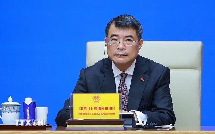 Thủ tướng Lê Minh Hưng gặp, trao đổi với các doanh nghiệp Trung Quốc đang đầu tư tại Việt Nam.  