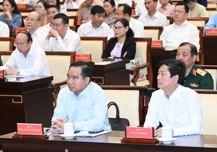  Chủ tịch UBND TPHCM Nguyễn Văn Được và Chủ tịch HĐND TPHCM Võ Văn Minh dự hội nghị. Ảnh: VIỆT DŨNG 