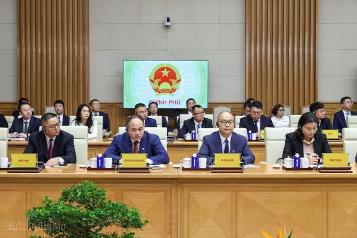 Các doanh nghiệp Trung Quốc đang đầu tư tại Việt Nam tham dự buổi gặp - Ảnh: VGP