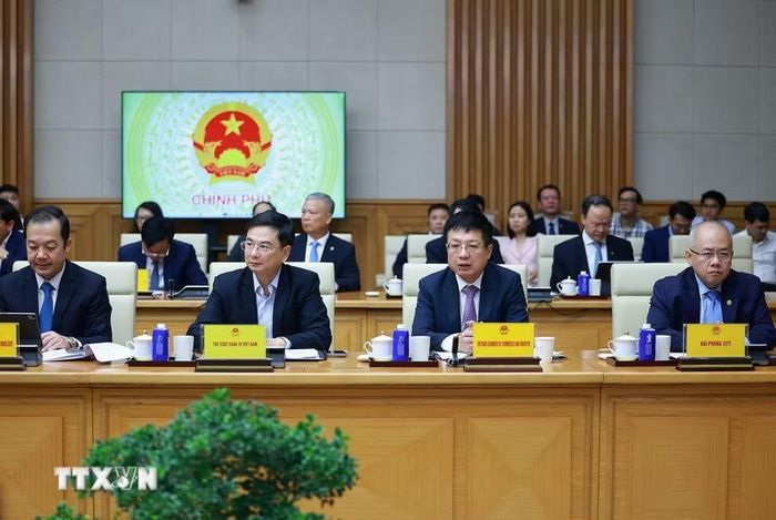 Đại diện các bộ, ngành tham dự buổi gặp các doanh nghiệp Trung Quốc đang đầu tư tại Việt Nam. (Ảnh: Dương Giang/TTXVN)
