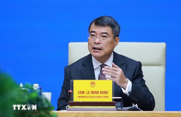 Thủ tướng Lê Minh Hưng gặp, trao đổi với các doanh nghiệp Trung Quốc đang đầu tư tại Việt Nam. (Ảnh: Dương Giang/TTXVN)