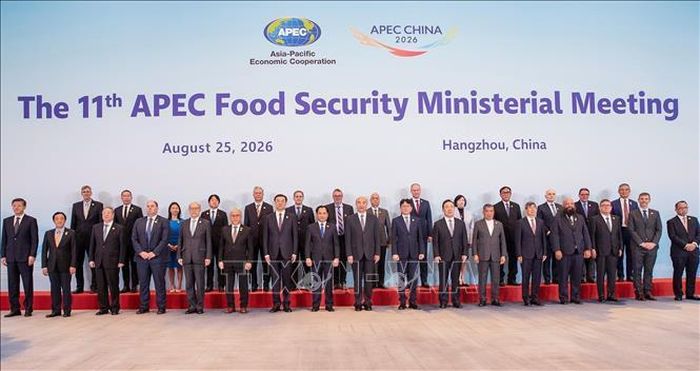 Lãnh đạo ngành nông nghiệp đến từ 21 nền kinh tế thành viên APEC chụp ảnh chung tại hội nghị. Ảnh: TTXVN phát