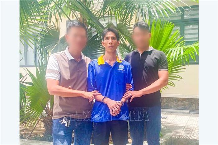 Đối tượng Hồ Như Ý bị bắt khi đang lẫn trốn tại xã Đức Lập, tỉnh Tây Ninh. Ảnh: TTXVN phát