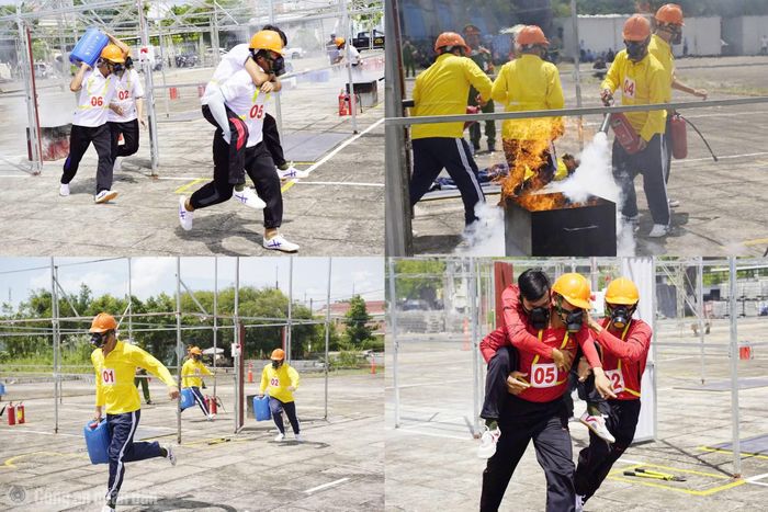Các “Tổ liên gia an toàn PCCC” khẩn trương xử lý tình huống cháy trong phần thi thực hành.