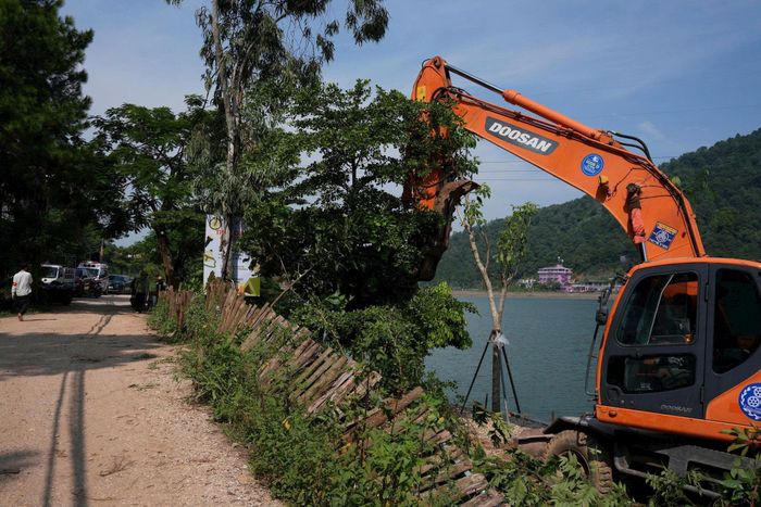 Dự kiến ngày 4-9 tới đây lực lượng chức năng xã Kim Anh sẽ tiếp tục triển khai biện pháp cưỡng chế các trường hợp vi phạm đất đai tại khu vực hồ Đồng Đò. Ảnh tư liệu: Sỹ Hào