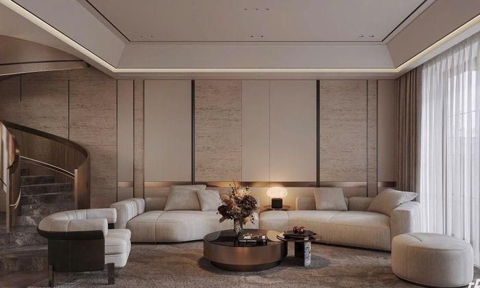 Theo hình ảnh được Văn Hậu chia sẻ, căn nhà được thiết kế hiện đại với tông màu kem ấm. Phòng khách khá rộng, nổi bật với chiếc ghế sofa dài cùng bàn trà nhỏ nhắn, hài hòa và đẹp mắt. Tường nhà được ốp gỗ tạo nên sự liên kết với không gian, sang trọng và ấm cúng.