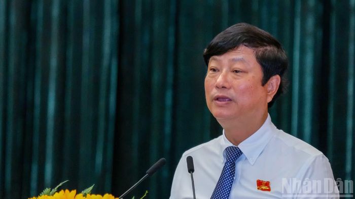 Đồng chí Võ Văn Minh, Ủy viên Trung ương Đảng, Chủ tịch Hội đồng nhân dân Thành phố phát biểu khai mạc Kỳ họp. (Ảnh: THẾ ANH)