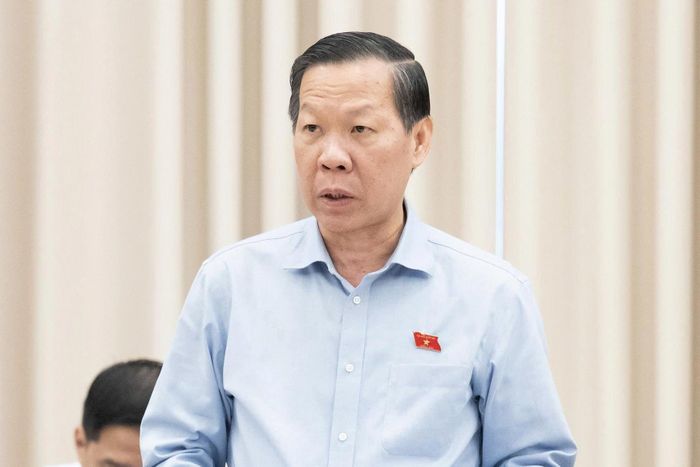 Chủ nhiệm Ủy ban Kinh tế và Tài chính Phan Văn Mãi trình bày báo cáo thẩm tra. Ảnh: Quốc hội