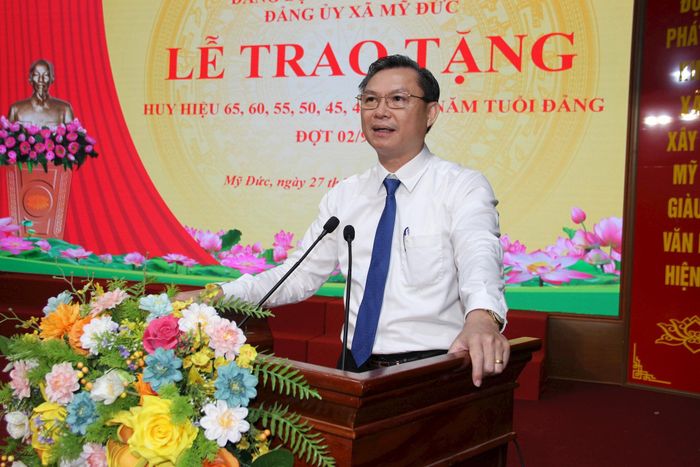 Bí thư Đảng ủy, Chủ tịch HĐND xã Mỹ Đức Đặng Văn Cảnh phát biểu tại buổi Lễ. Ảnh: Biên Phạm