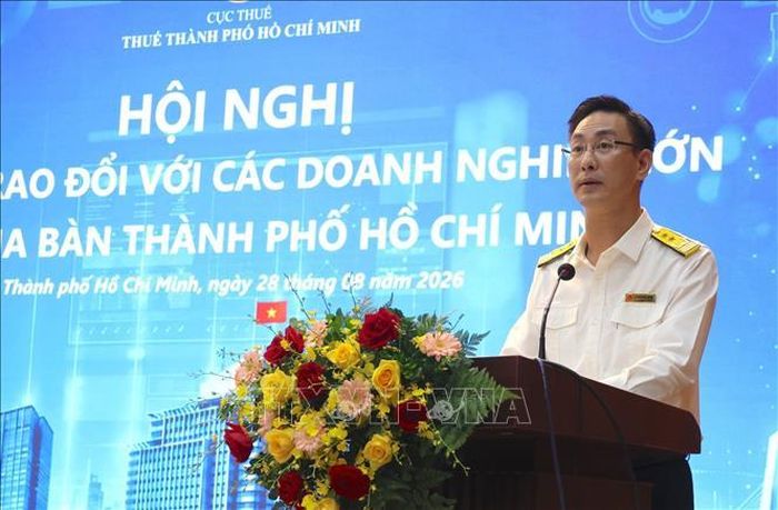 Ông Đoàn Minh Dũng, Trưởng Thuế TP Hồ Chí Minh, phát biểu khai mạc hội nghị. Ảnh: Hứa Chung/TTXVN