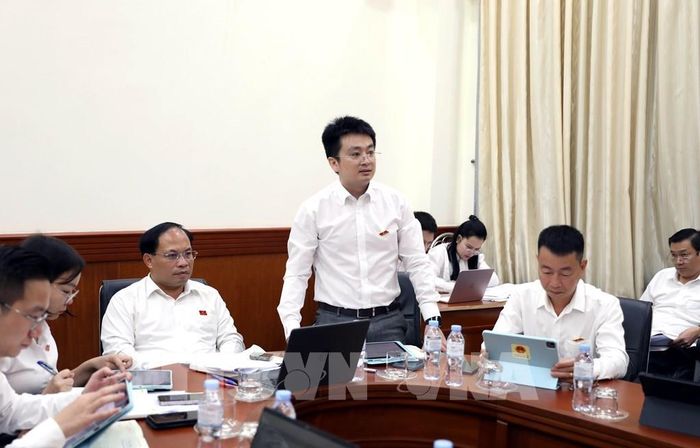 Đại biểu thảo luận tại tổ. Ảnh: Quang Cường – TTXVN