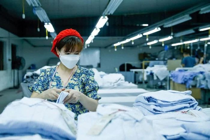 Công nhân làm việc tại Công ty may Thái An - Hải Phòng. Ảnh: Đức Thanh