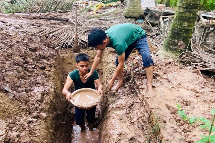 Sau nhiều ngày đào nhiều lớp đất tại khu vực nghĩa trang Cả Cái cũ, Đội K91 đã tìm thấy 63 hài cốt liệt sĩ. Ảnh: Trung Thắng
