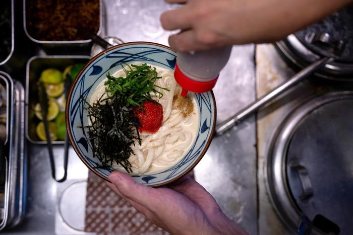  Món mì udon của nhà hàng Marugame. Ảnh: Louise Delmotte/Bloomberg. 