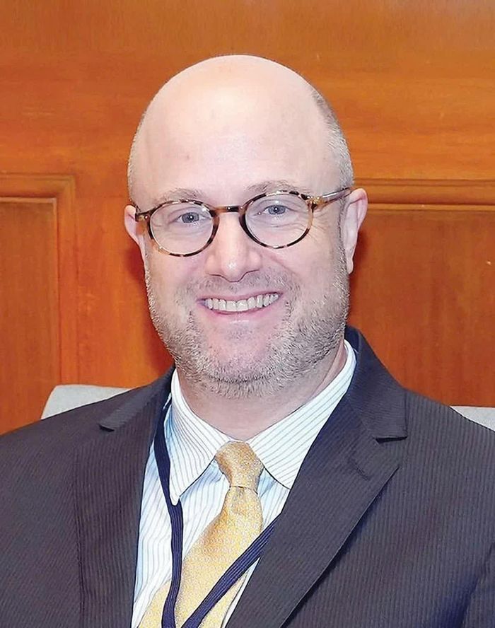 Ông Adam Sitkoff
