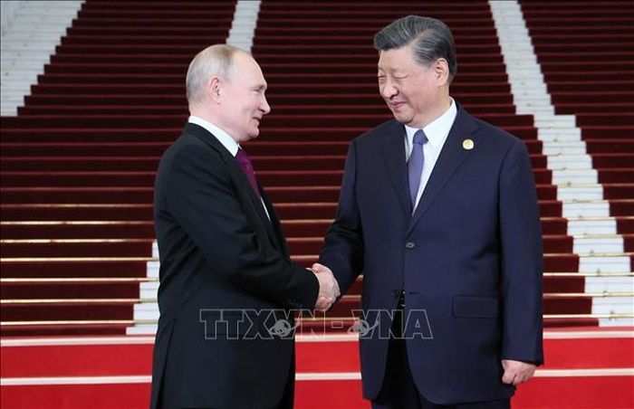 Chủ tịch Trung Quốc Tập Cận Bình (phải) và Tổng thống Nga Vladimir Putin tại Bắc Kinh. Ảnh tư liệu: AFP/TTXVN