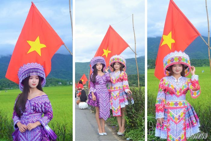 Chị Sùng Thị Thương (váy hồng) cùng bạn check-in đường cờ Tổ quốc tại phường Mường Thanh.