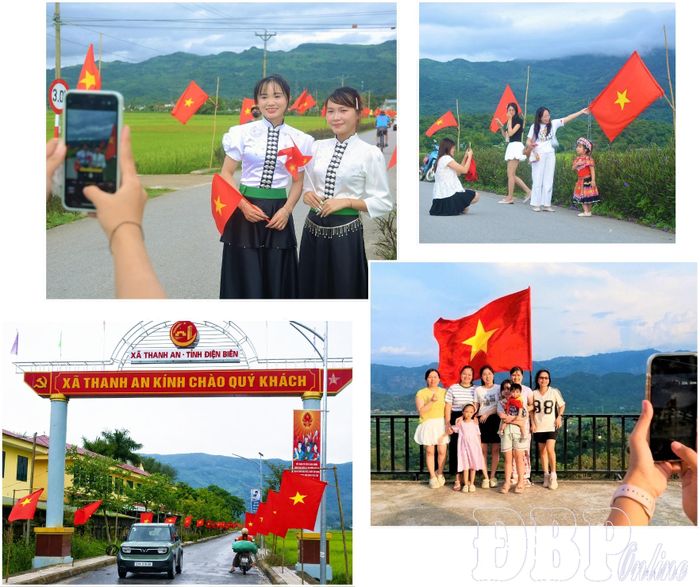 Quốc kỳ tạo nên không gian rực rỡ, thu hút người dân đến tham quan.